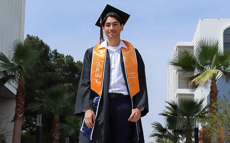 Man in commencement regalia